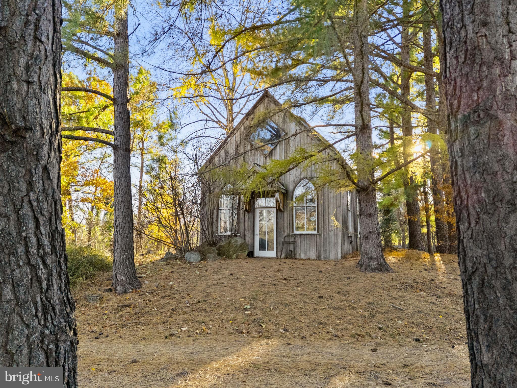 3393 Lost Corner Road Delaplane, VA 20144 - Photo 3 of 6 a front view of a house with a yard