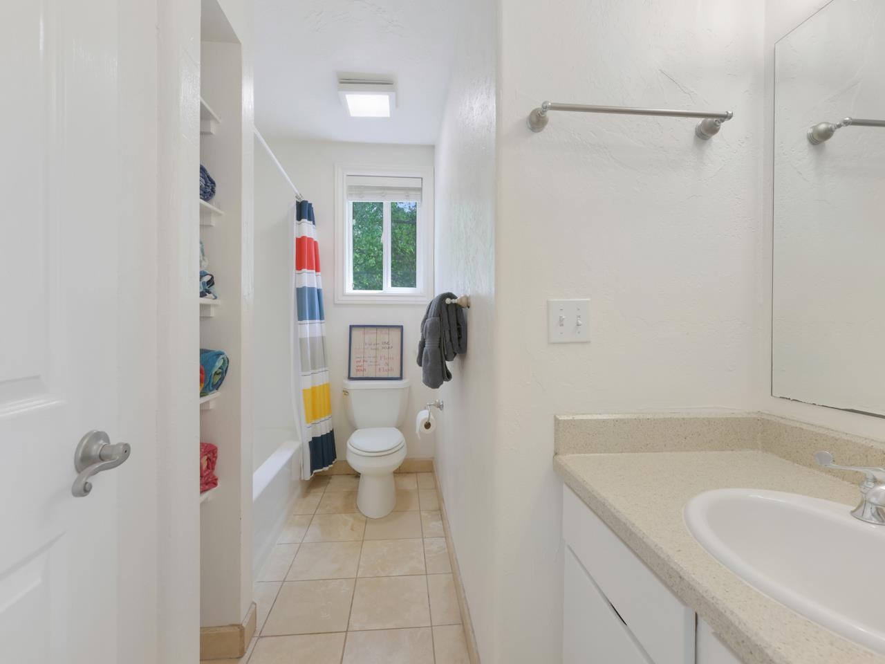2433 H Road Grand Junction, CO 81505 - Photo 28 of 42 a bathroom with a sink toilet and shower