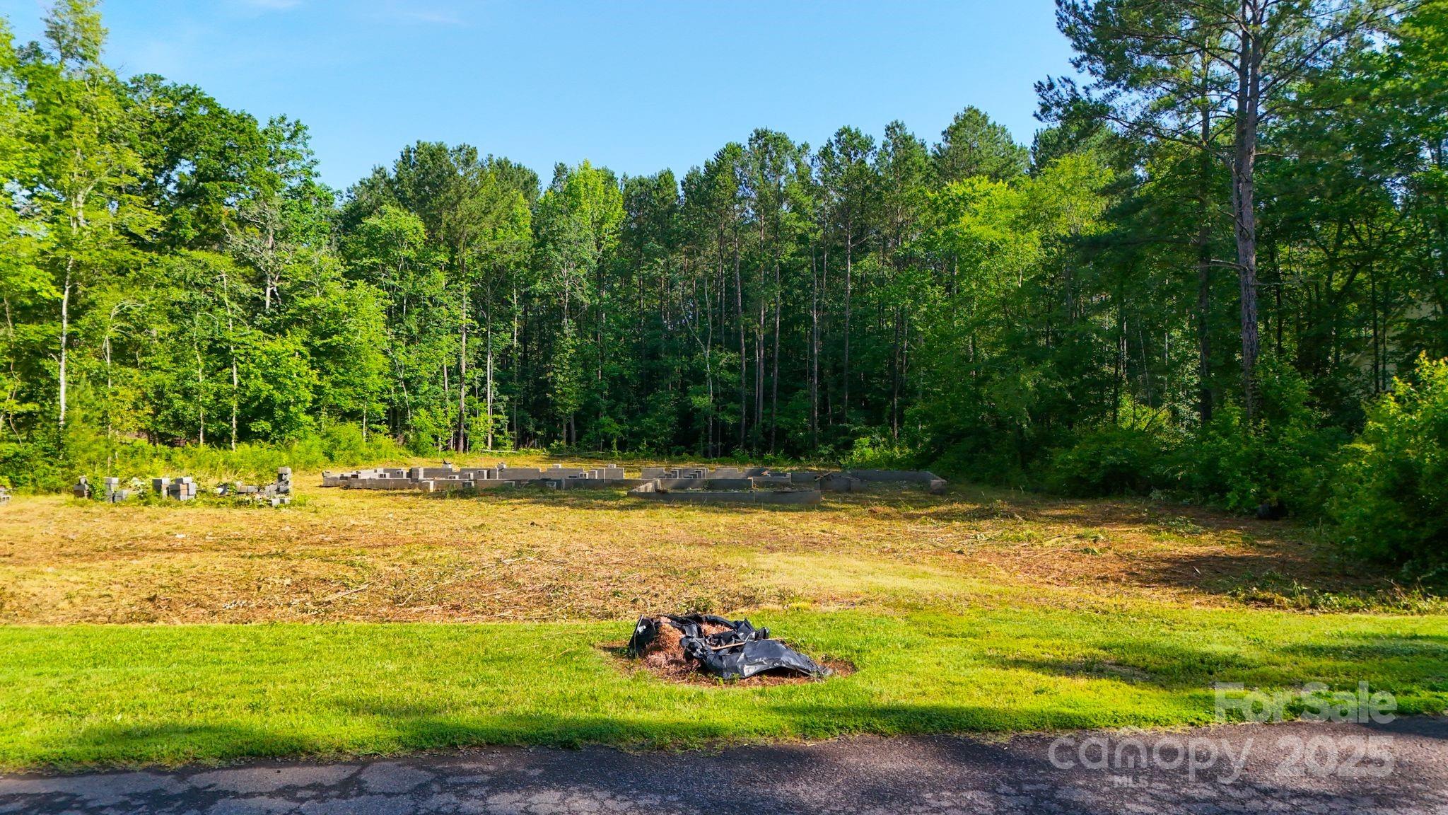 699 Bellegray Road Clover, SC 29710 - Photo 7 of 10 a view of a swimming pool with an outdoor space and seating area