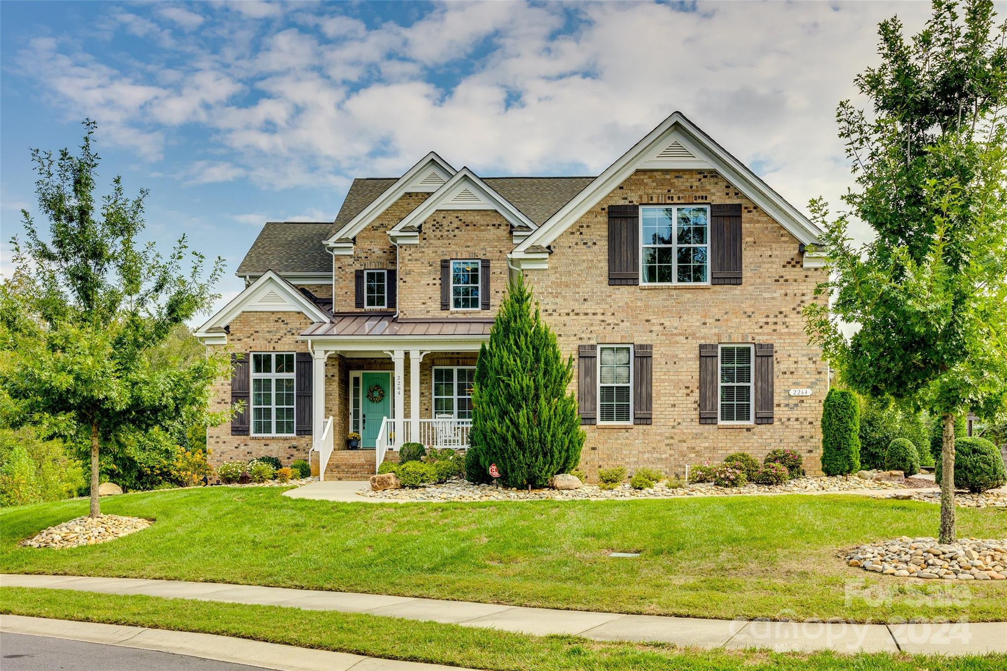 2264 Watermark Point Place Fort Mill, SC 29708 - Photo 1 of 48 a front view of a house with a yard