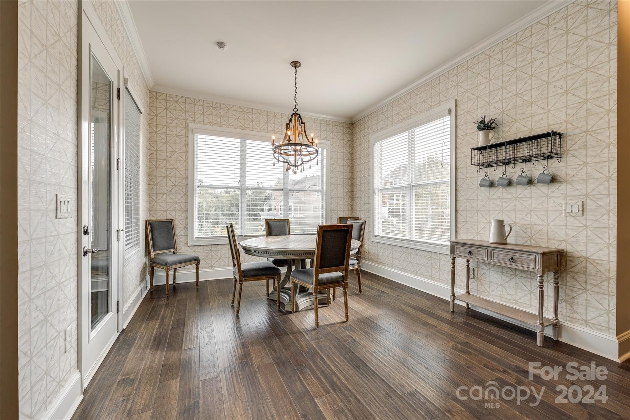 2264 Watermark Point Place Fort Mill, SC 29708 - Photo 12 of 48 a view of a dining room with furniture window and wooden floor