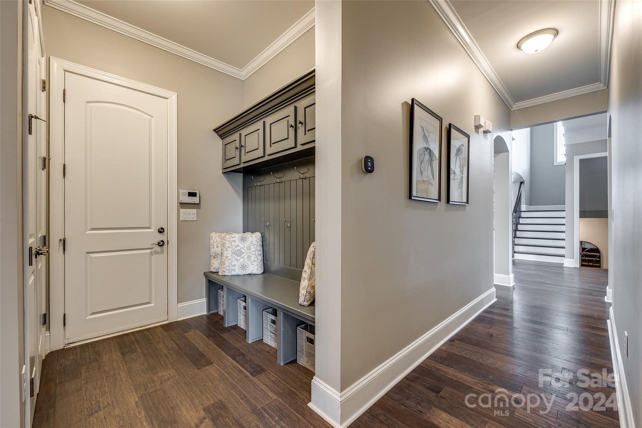 2264 Watermark Point Place Fort Mill, SC 29708 - Photo 15 of 48 a view of a hallway with workspace and wooden floor