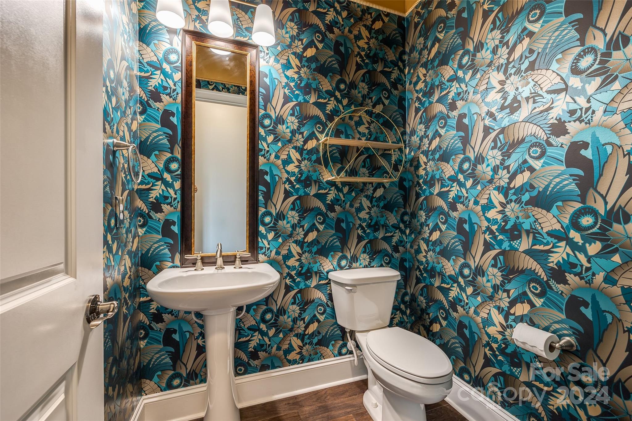 2264 Watermark Point Place Fort Mill, SC 29708 - Photo 17 of 48 a white toilet sitting next to a shower curtain