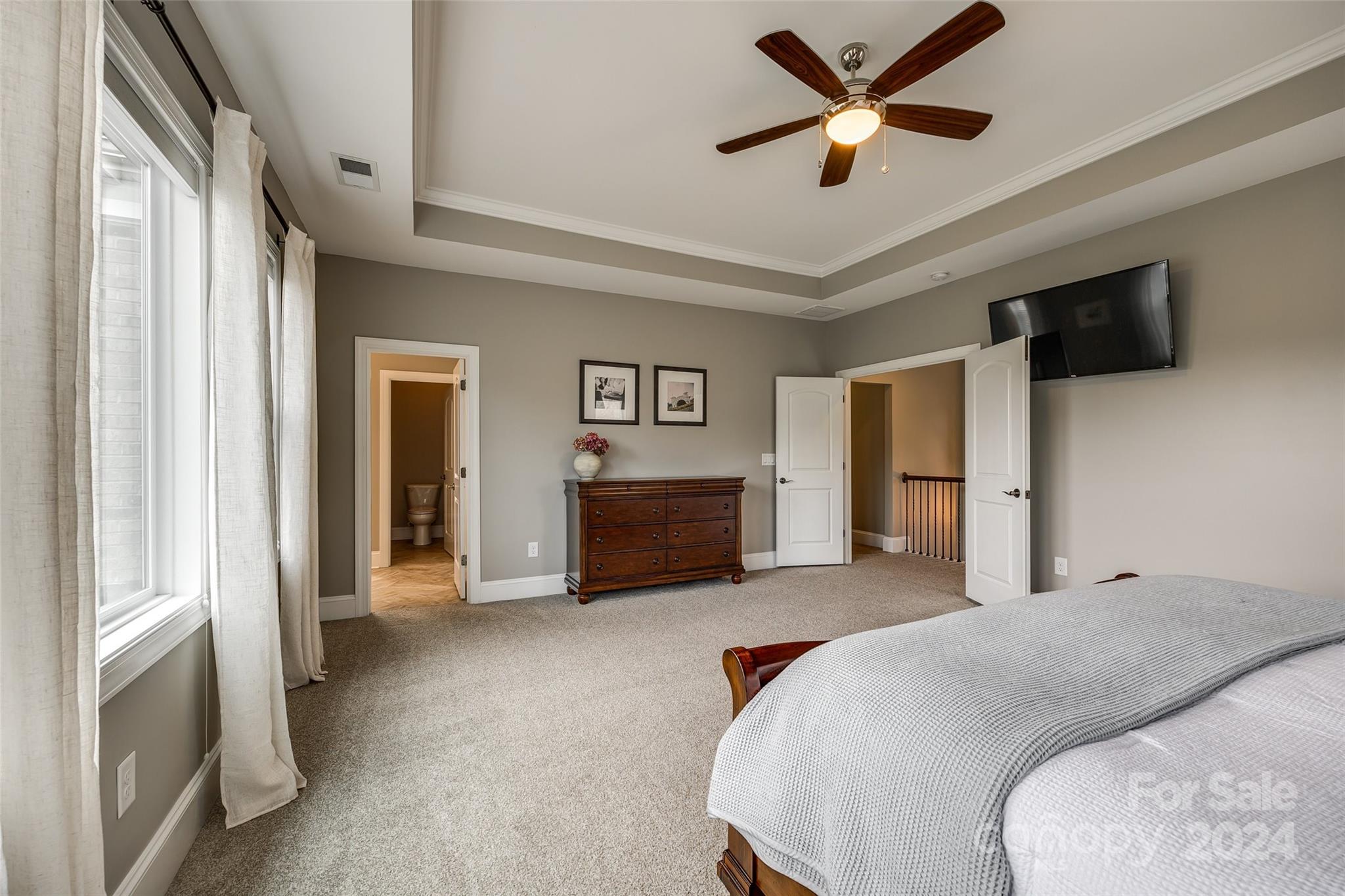 2264 Watermark Point Place Fort Mill, SC 29708 - Photo 19 of 48 a bed room with a bed and a television