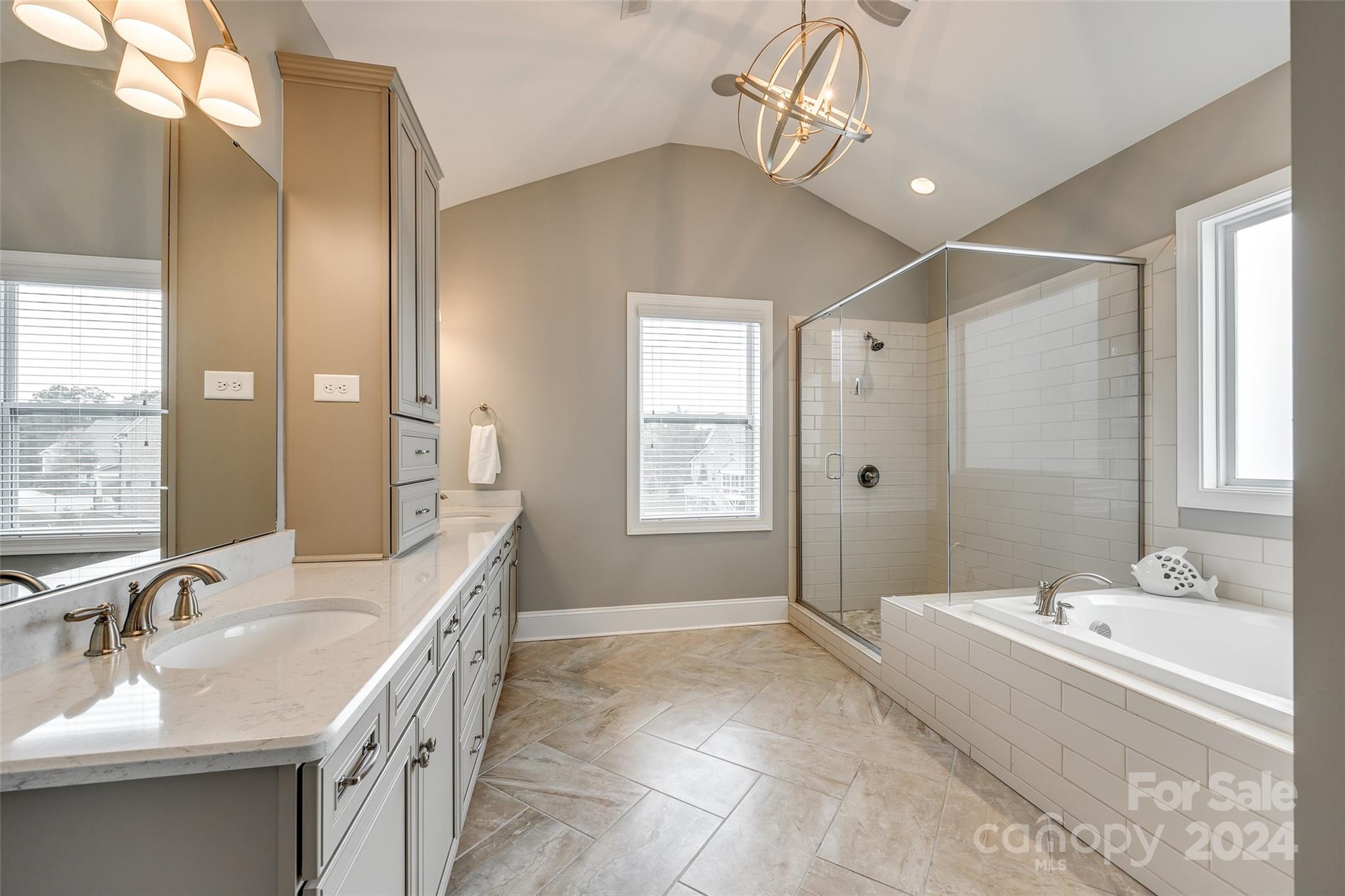 2264 Watermark Point Place Fort Mill, SC 29708 - Photo 20 of 48 a bathroom with a tub sink and mirror