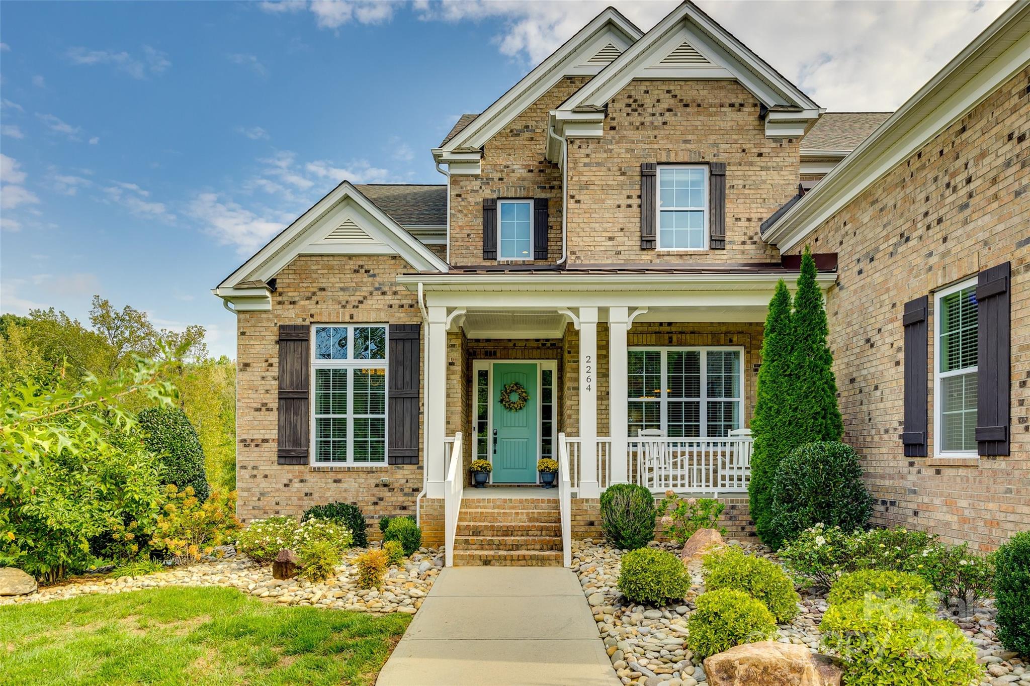 2264 Watermark Point Place Fort Mill, SC 29708 - Photo 2 of 48 front view of a house with a yard