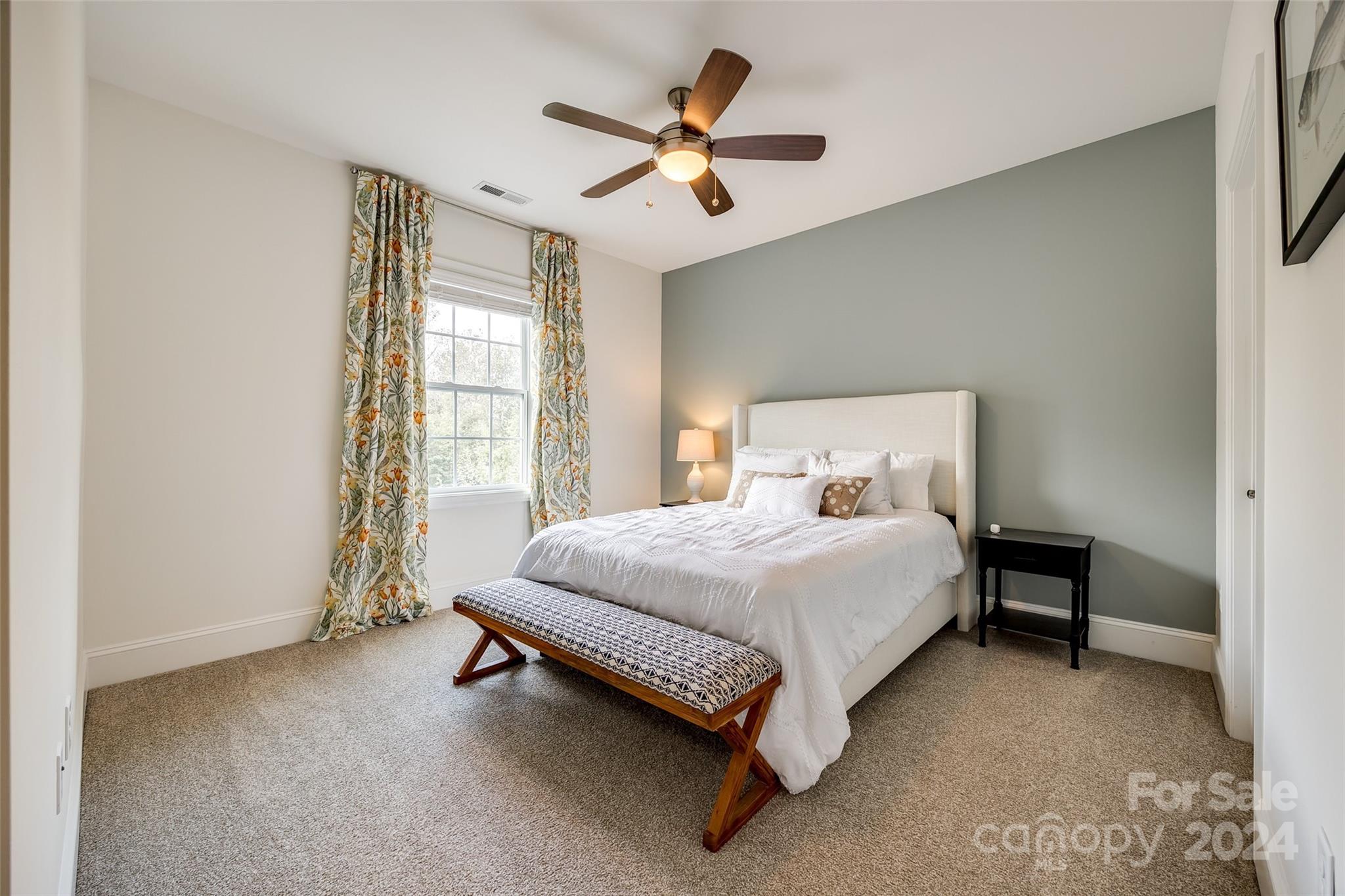 2264 Watermark Point Place Fort Mill, SC 29708 - Photo 26 of 48 a bedroom with a bed and window