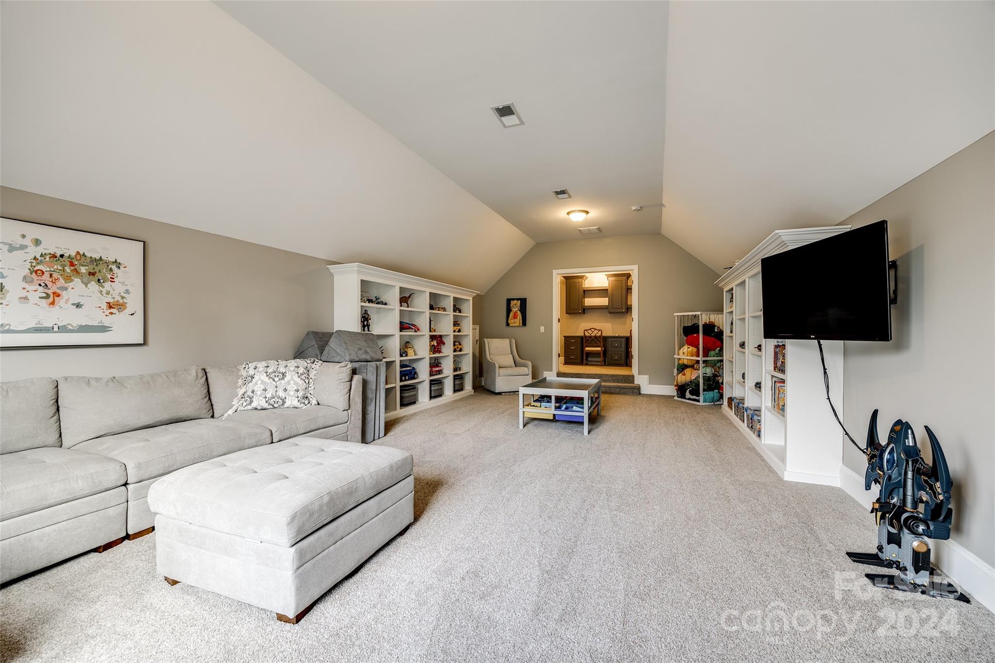 2264 Watermark Point Place Fort Mill, SC 29708 - Photo 30 of 48 a living room with furniture and a flat screen tv
