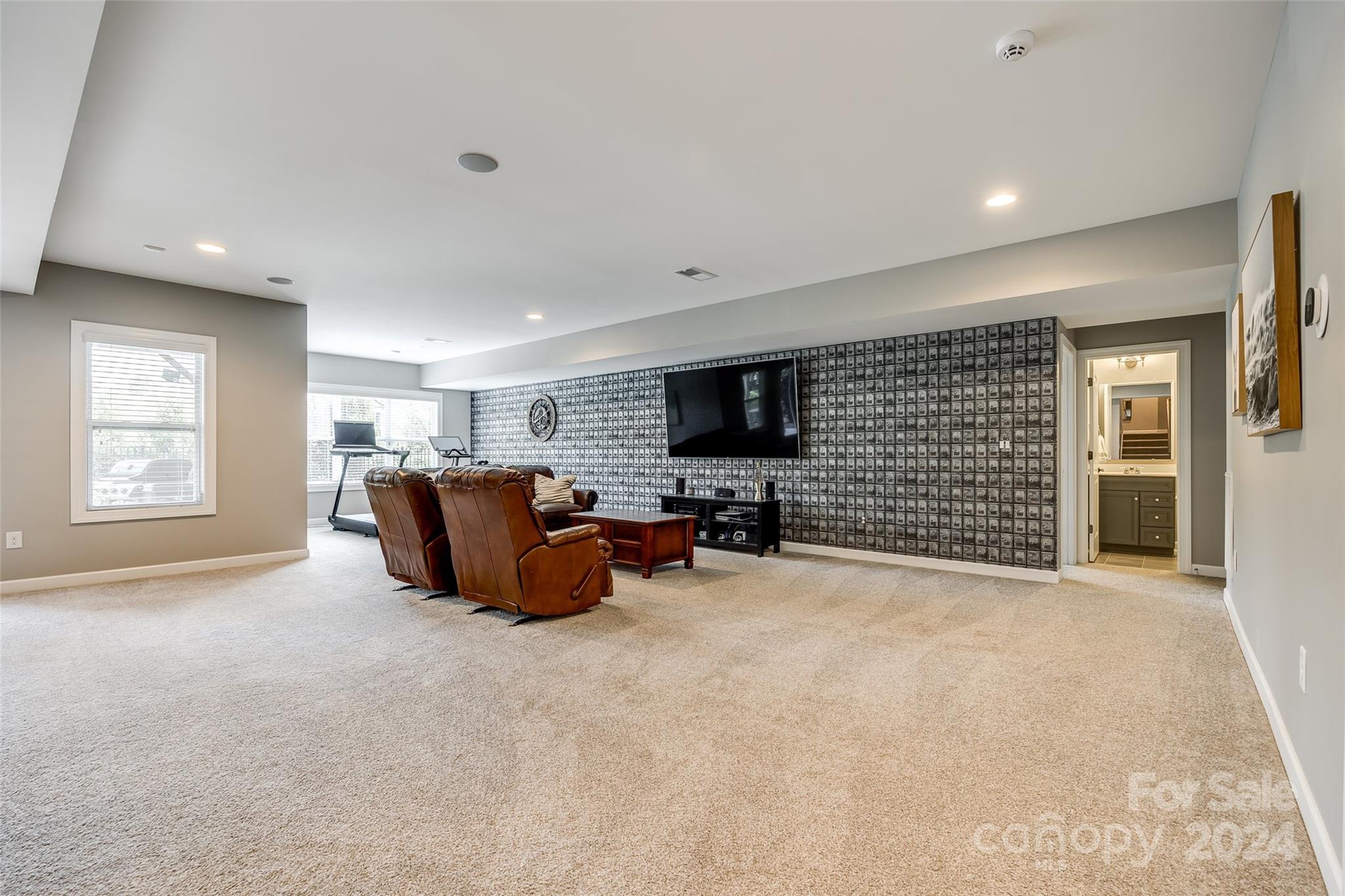 2264 Watermark Point Place Fort Mill, SC 29708 - Photo 32 of 48 a living room with furniture and a flat screen tv