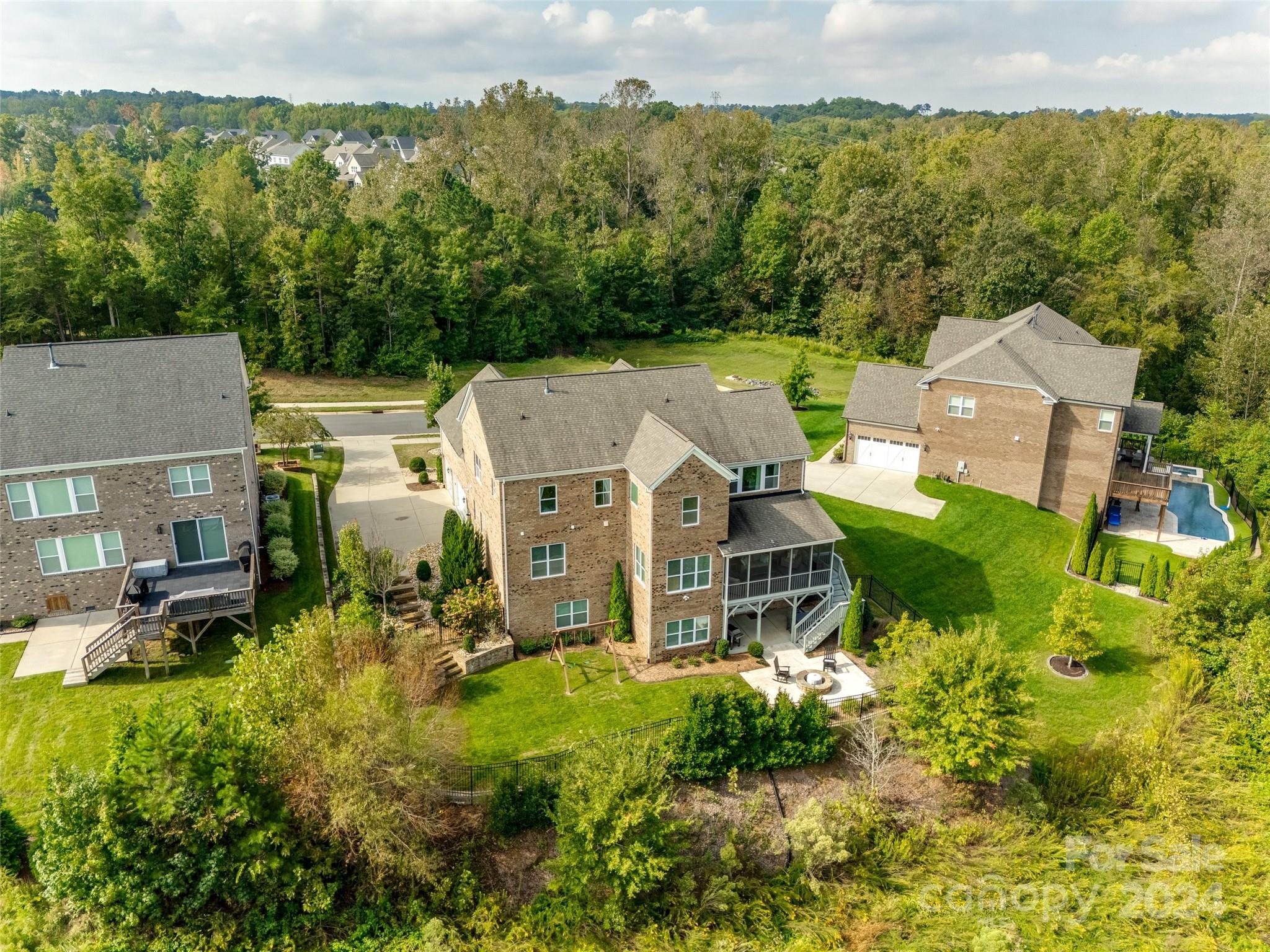 2264 Watermark Point Place Fort Mill, SC 29708 - Photo 44 of 48 an aerial view of a house with a garden and lake view