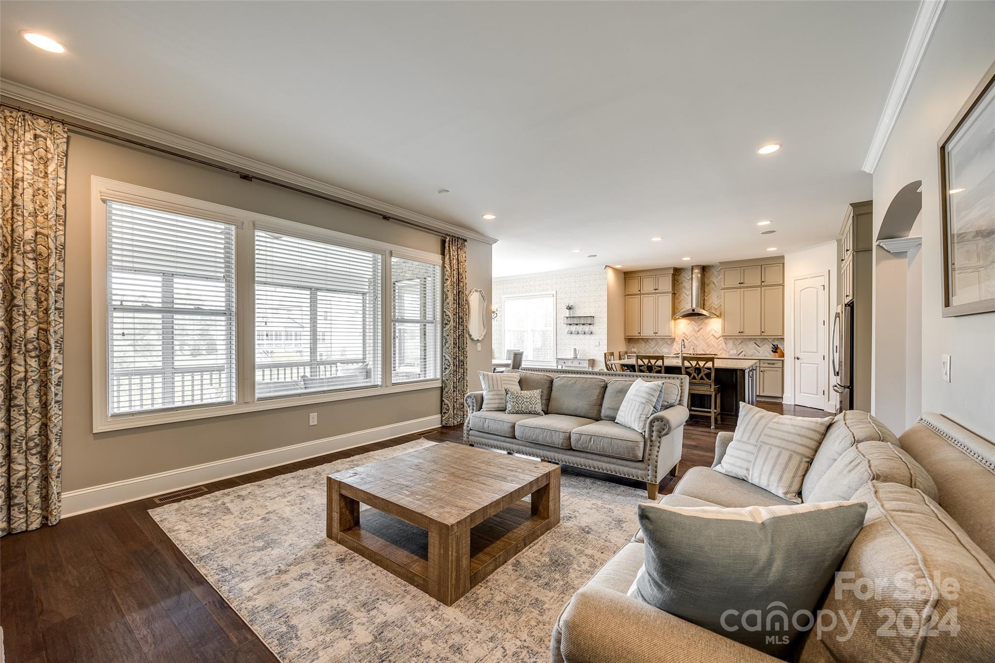 2264 Watermark Point Place Fort Mill, SC 29708 - Photo 8 of 48 a living room with furniture and a window