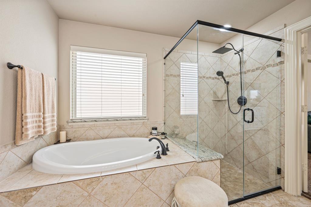 5209 Edgebrook Way Fort Worth, TX 76244 - Photo 18 of 33 a bathroom with a granite countertop sink a toilet and shower