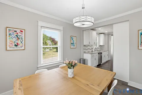a living room with furniture and windows