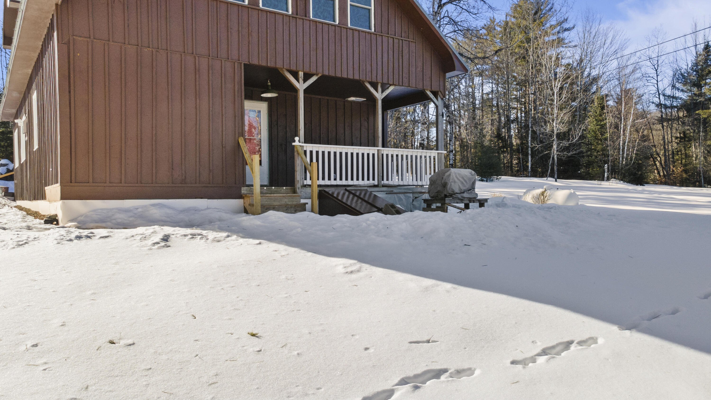 162 Wellington Road Harmony, ME 04942 - Photo 32 of 50 32 Backyard with Private Primary Porch