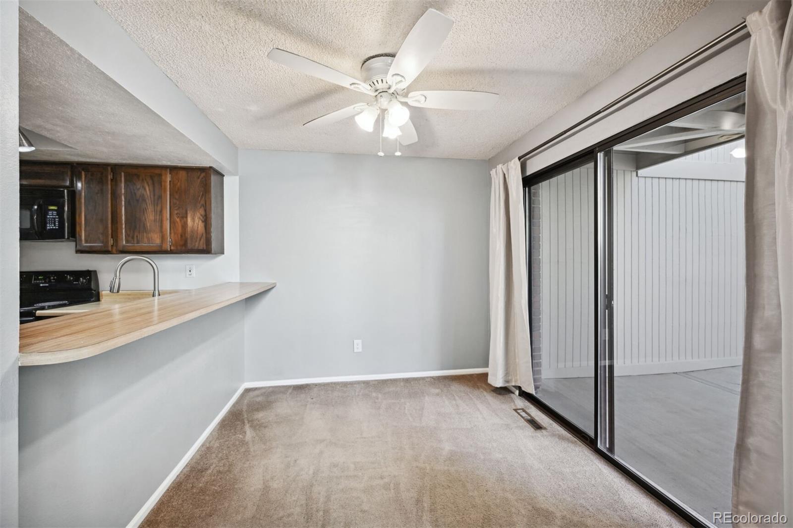 72 South Holman Way Golden, CO 80401 - Photo 15 of 34 a view of a kitchen with a sink and a window
