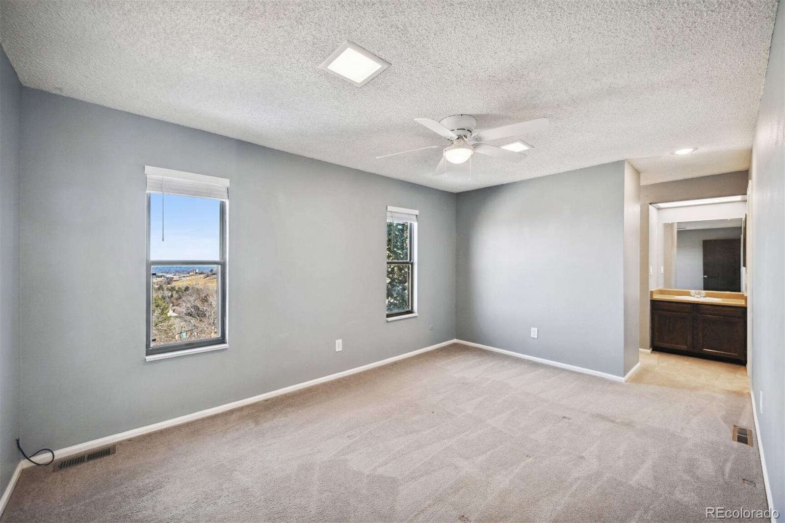 72 South Holman Way Golden, CO 80401 - Photo 23 of 34 a view of an empty room with a window