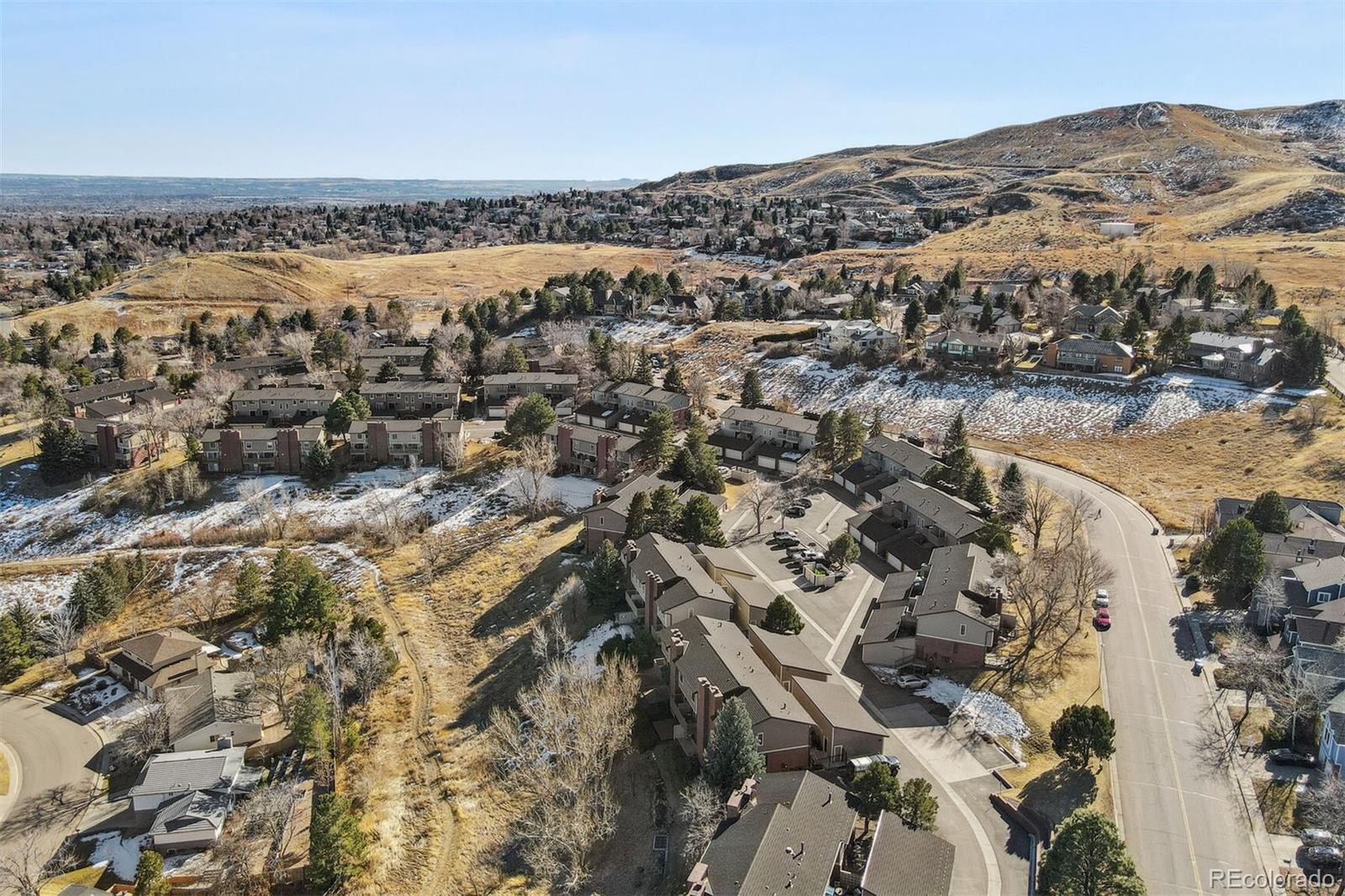 72 South Holman Way Golden, CO 80401 - Photo 3 of 34 an aerial view of residential houses with outdoor space