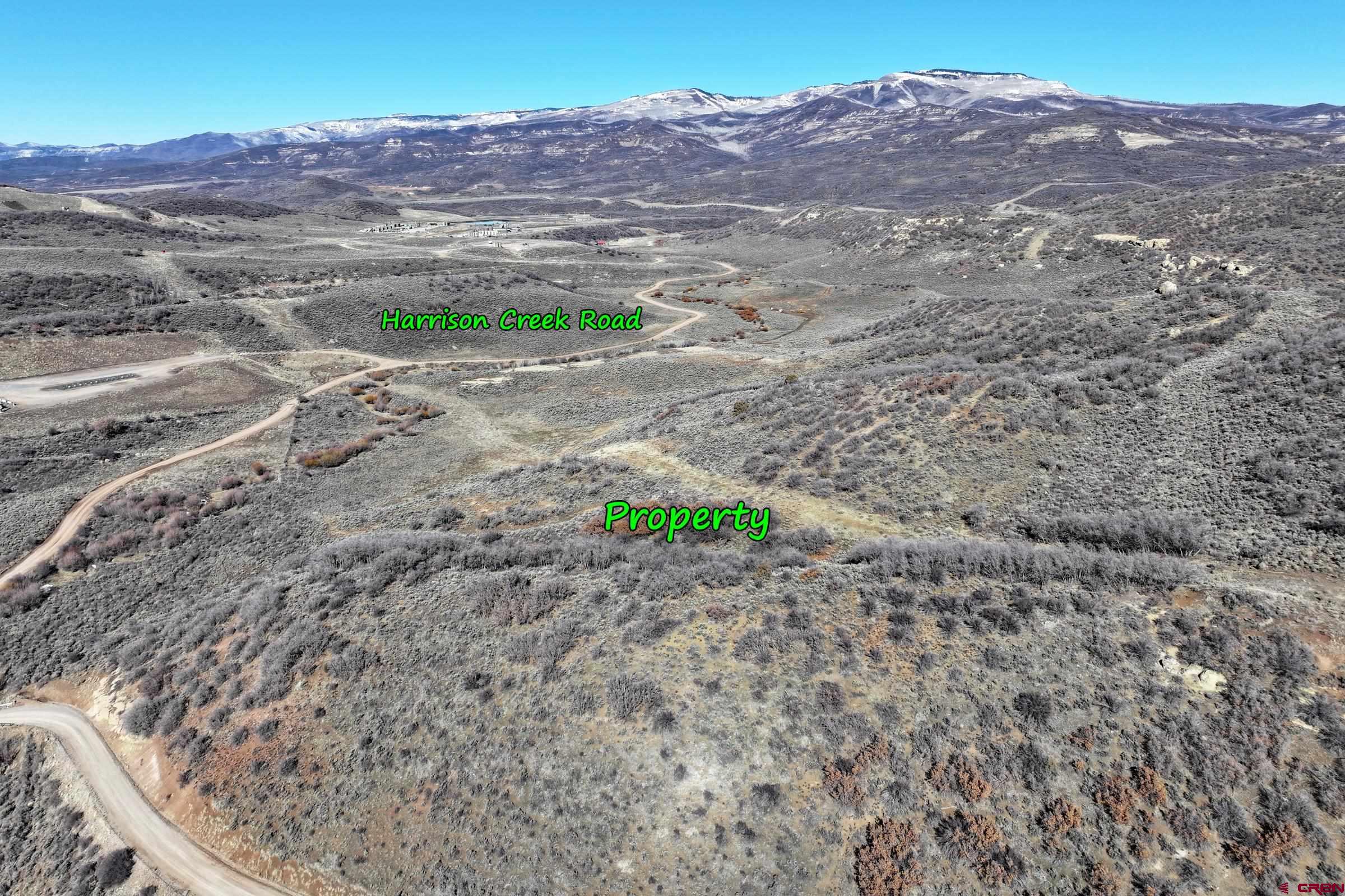 Tbd Harrison Gulch Road Collbran, CO 81624 - Photo 10 of 11 a view of a dry yard with wooden fence