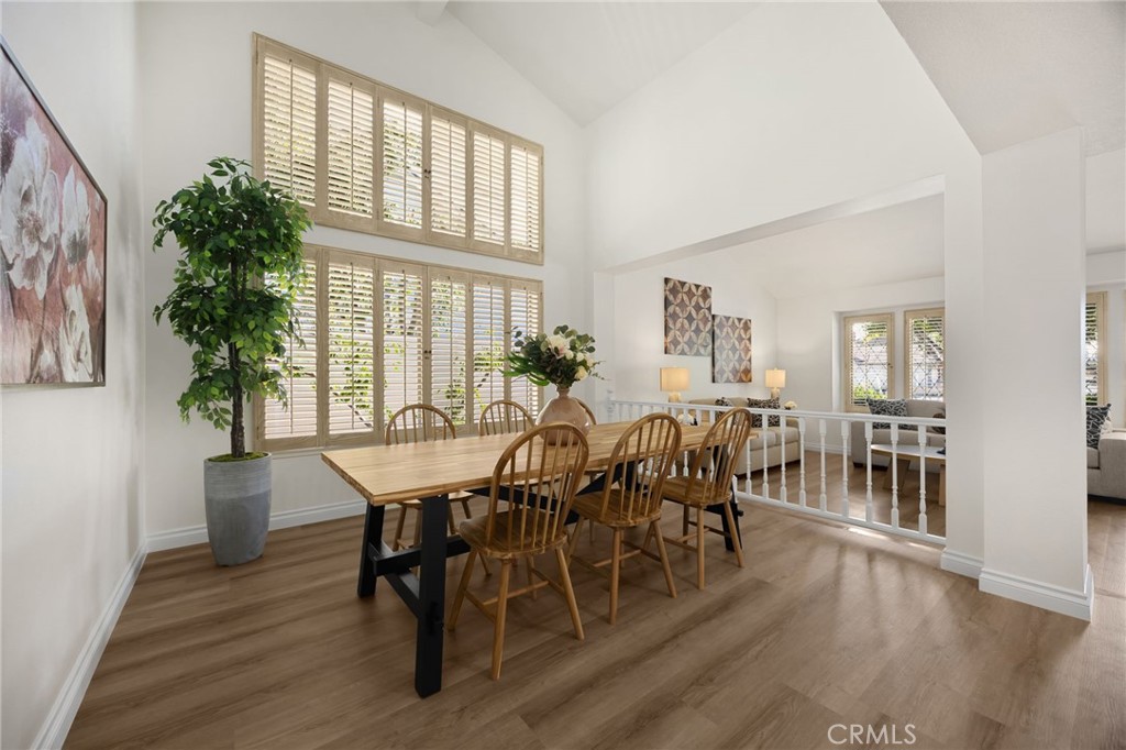 2959 Bluebell Avenue Brea, CA 92821 - Photo 7 of 22 a view of a dining room with furniture and wooden floor