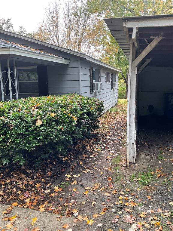 8582 Jc Road Vale, NC 28168 - Photo 5 of 15 a view of a house with a yard