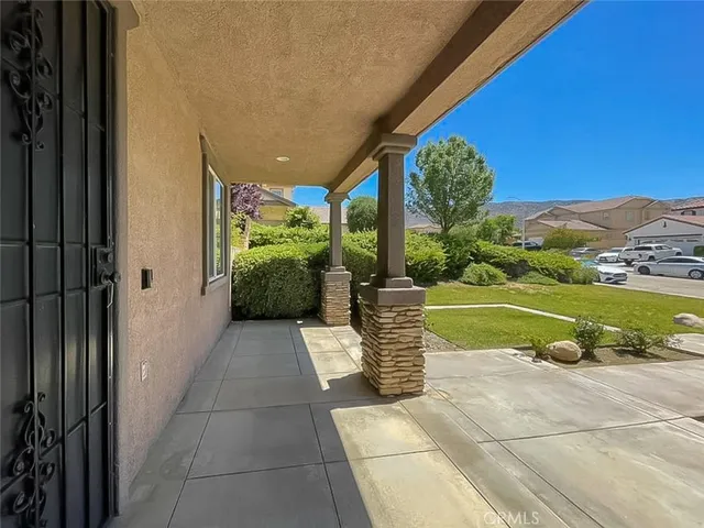 a view of porch with garden