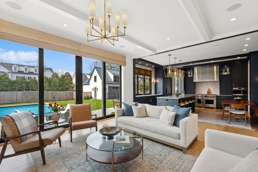 240 Raleigh Road Kenilworth, IL 60043 - Photo 20 of 71 a living room with furniture and a large window