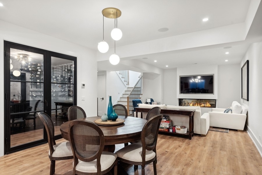 240 Raleigh Road Kenilworth, IL 60043 - Photo 51 of 71 a living room with furniture and a flat screen tv