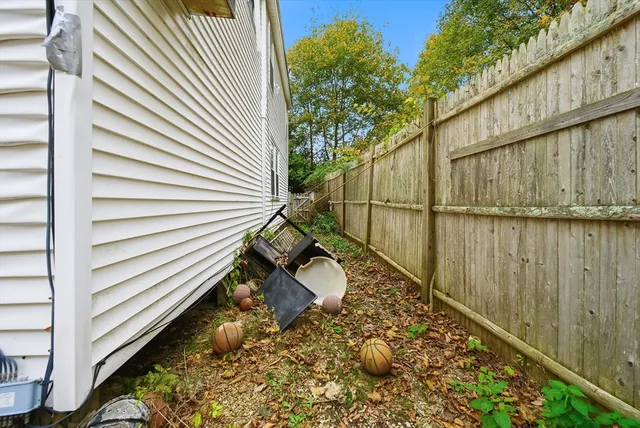 a house with wooden fence