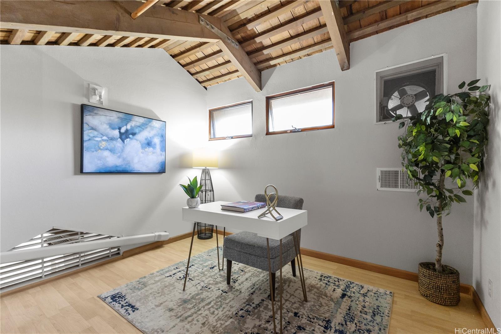 445 Kawailoa Road, Unit 8 Kailua, HI 96734 - Photo 16 of 25 a reading room with furniture and a potted plant