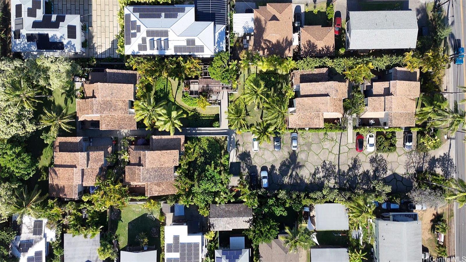 445 Kawailoa Road, Unit 8 Kailua, HI 96734 - Photo 23 of 25 an aerial view of a houses with yard