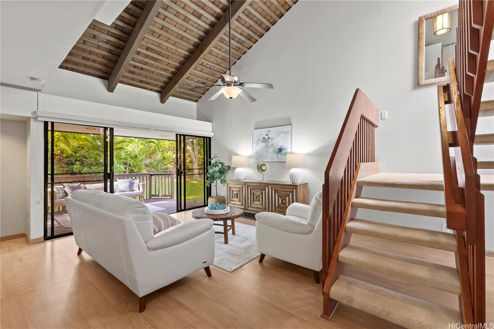 445 Kawailoa Road, Unit 8 Kailua, HI 96734 - Photo 6 of 25 a living room with furniture and a large window