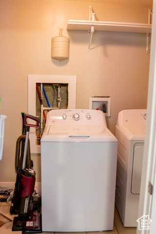 2269 Clear Creek Road Nibley, UT 84321 - Photo 19 of 27 Laundry room featuring separate washer and dryer and tile patterned floors