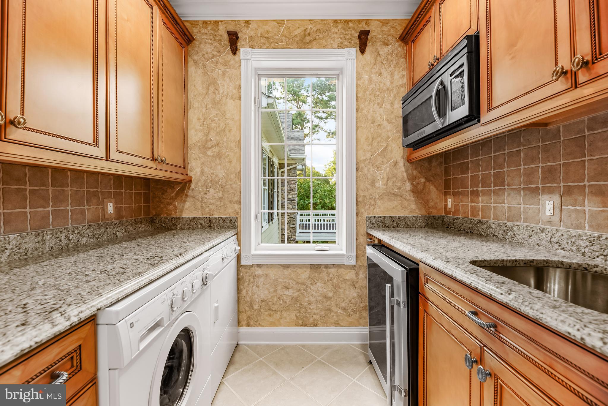 16105 Thomas Road Piney Point, MD 20674 - Photo 59 of 89 Primary Wet Bar & Laundry