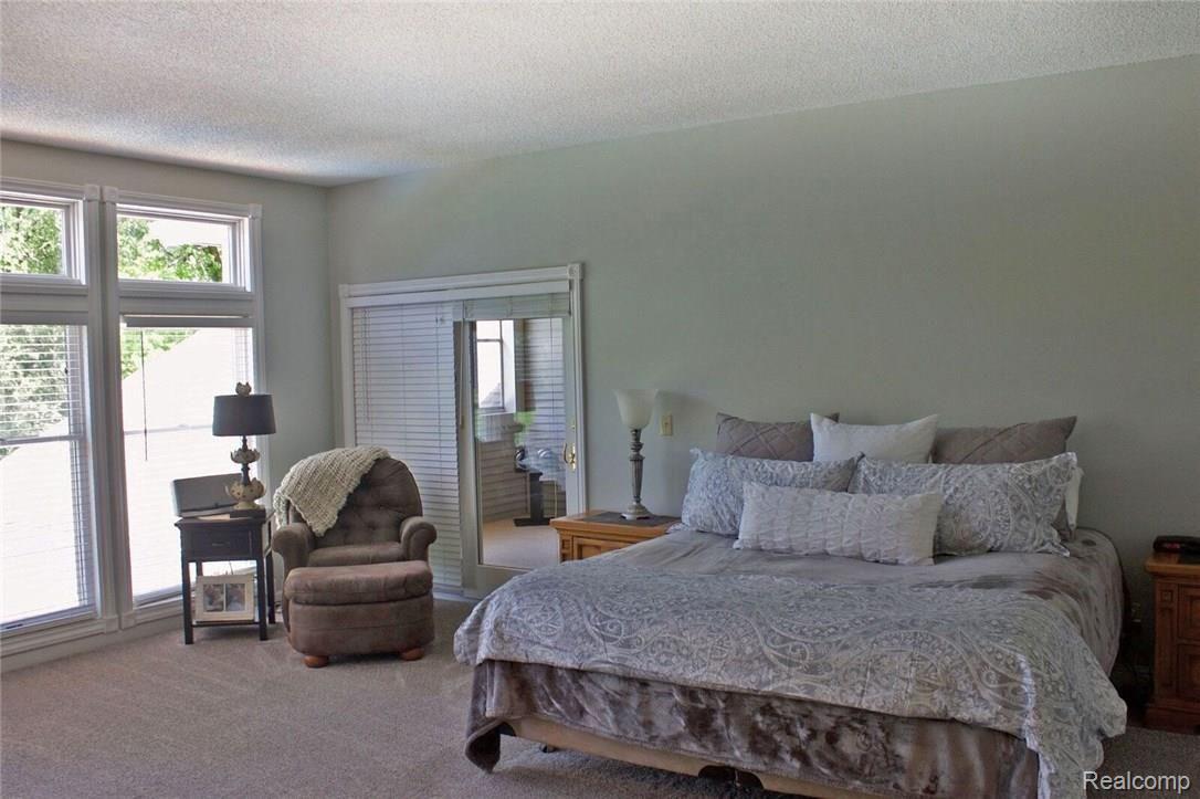 8096 Chilson Road Pinckney, MI 48169 - Photo 37 of 46 Master Bedroom