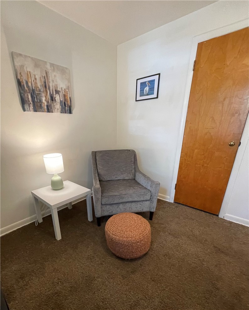360 Ridge Street Piqua, OH 45356 - Photo 24 of 46 This cozy corner offers a quiet retreat, perfect for reading or relaxation.