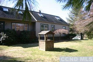 1962 Red Rock Road Austerlitz, NY 12037 - Photo 1 of 1 a front view of a house with garden