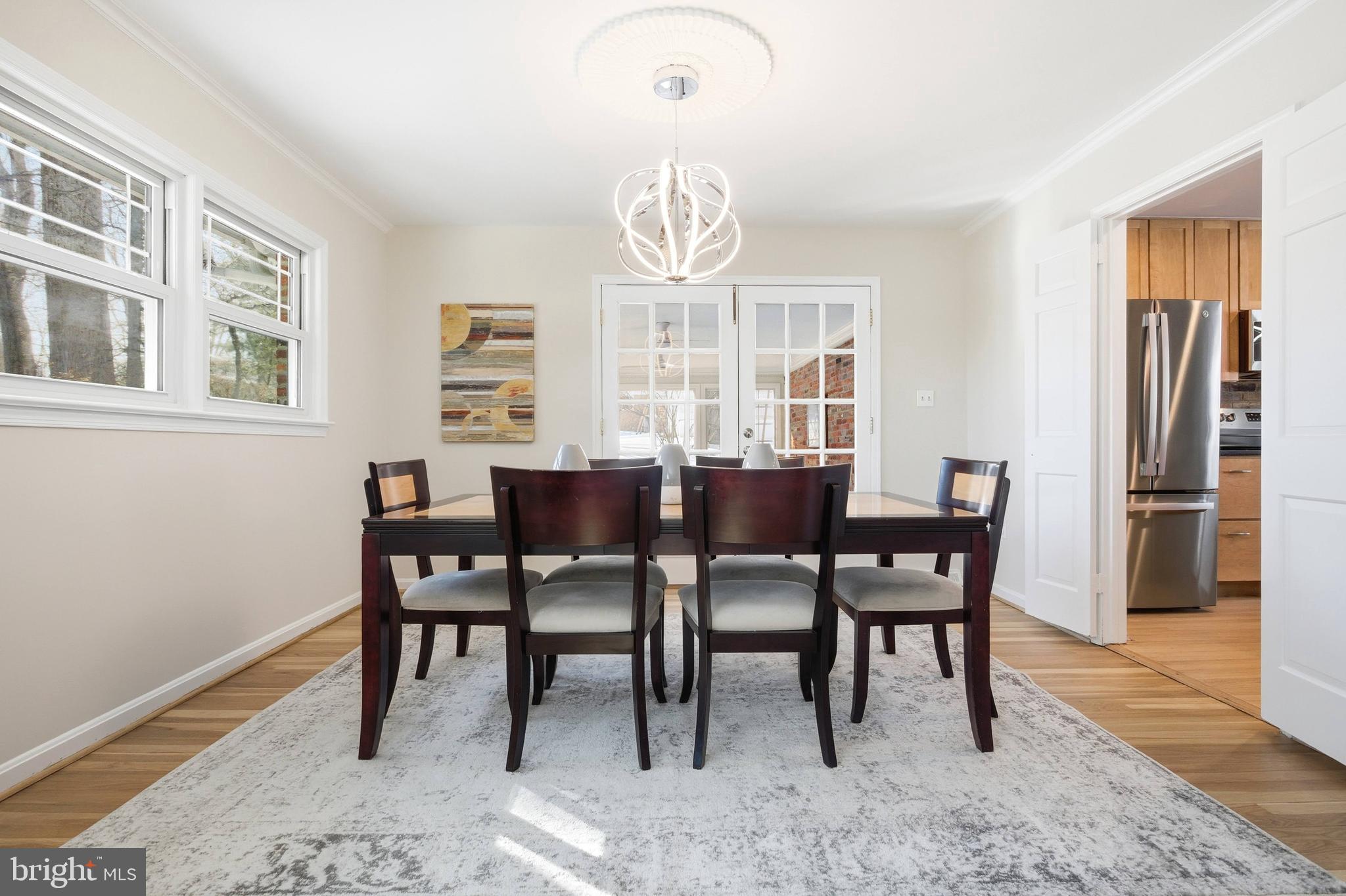 521 Creek Crossing Road Northeast Vienna, VA 22180 - Photo 15 of 63 a view of a dining room with furniture