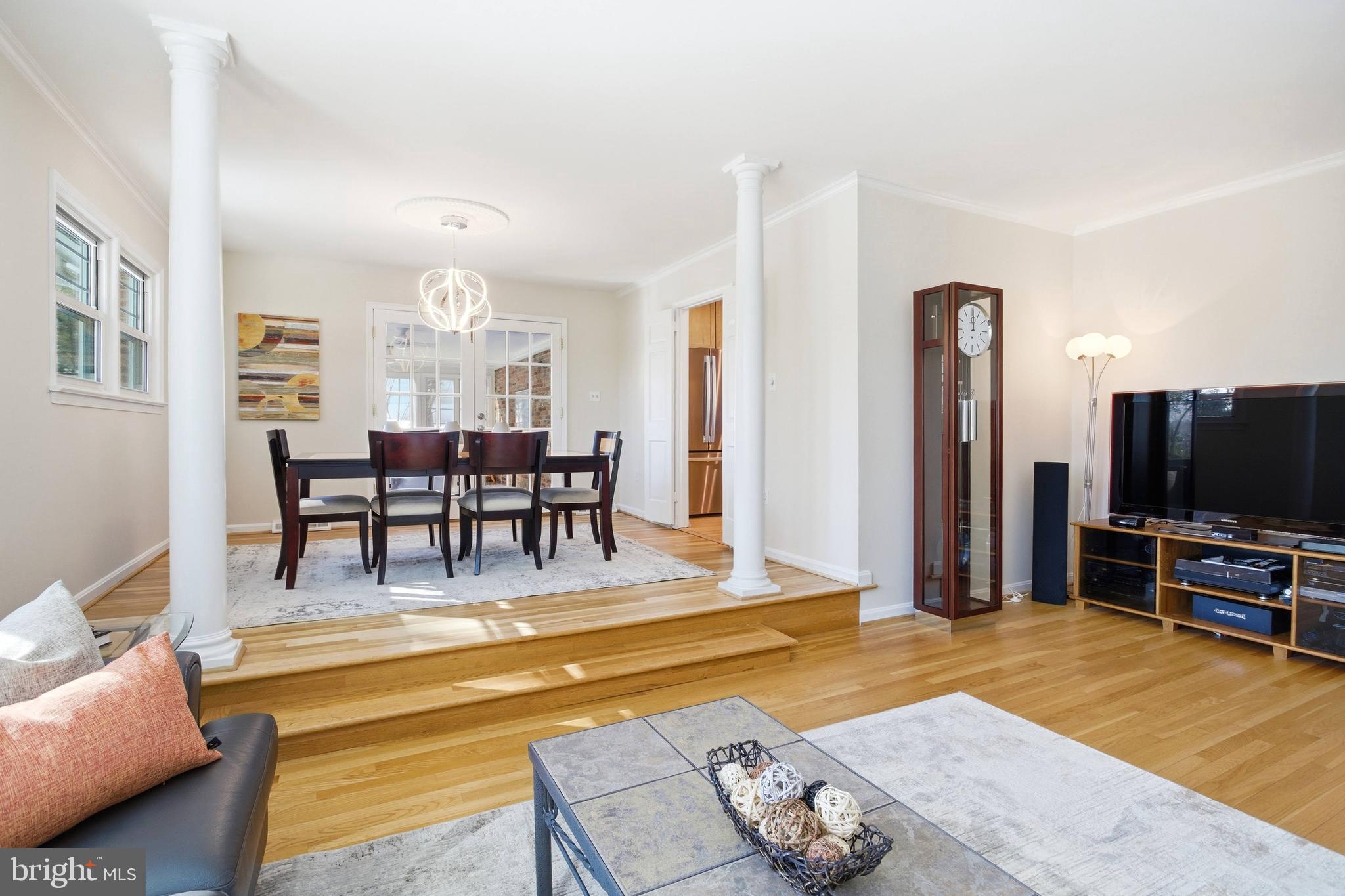 521 Creek Crossing Road Northeast Vienna, VA 22180 - Photo 16 of 63 a view of a livingroom with furniture and a flat screen tv