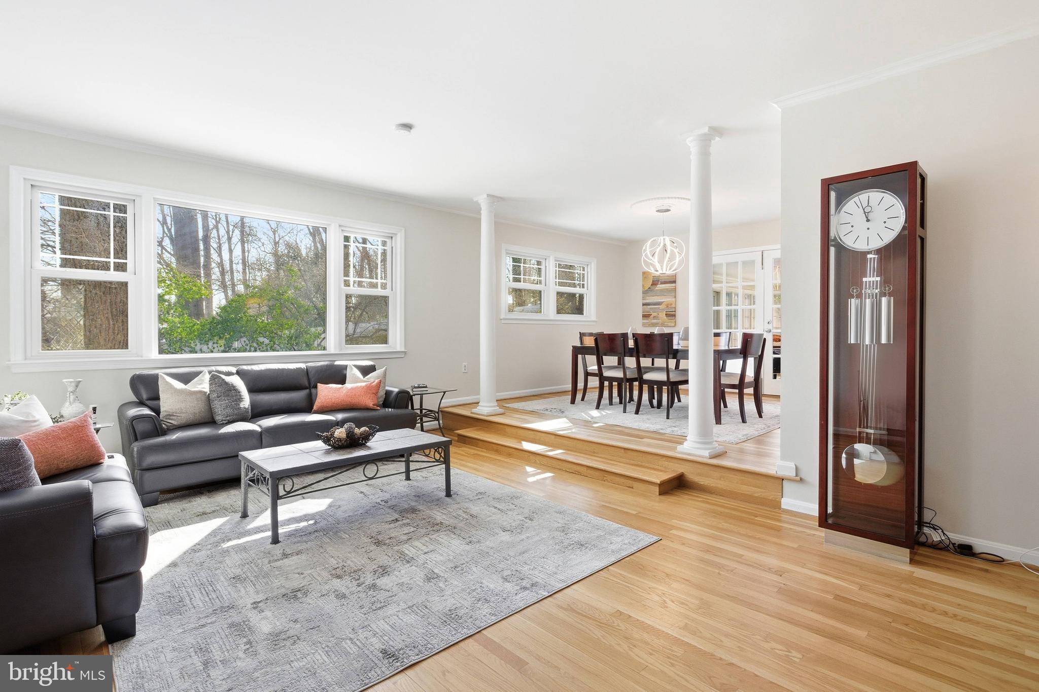 521 Creek Crossing Road Northeast Vienna, VA 22180 - Photo 19 of 63 a living room with furniture and a table