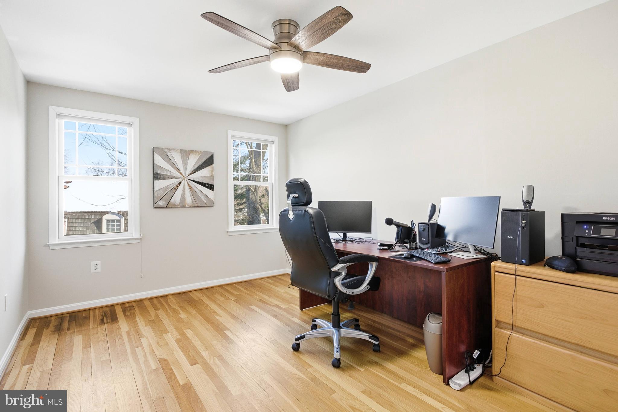521 Creek Crossing Road Northeast Vienna, VA 22180 - Photo 36 of 63 a view of a workspace with furniture and a window