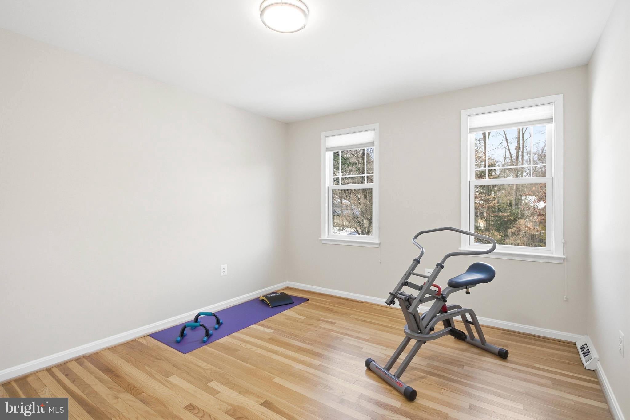 521 Creek Crossing Road Northeast Vienna, VA 22180 - Photo 39 of 63 a view of a workspace with furniture and a window