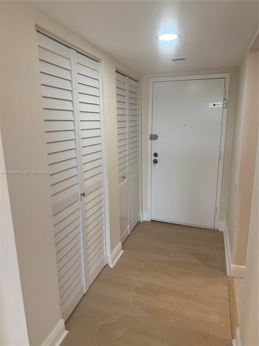 484 Northwest 165th St Road, Unit A512 Miami, FL 33169 - Photo 16 of 16 a view of a room with an empty space