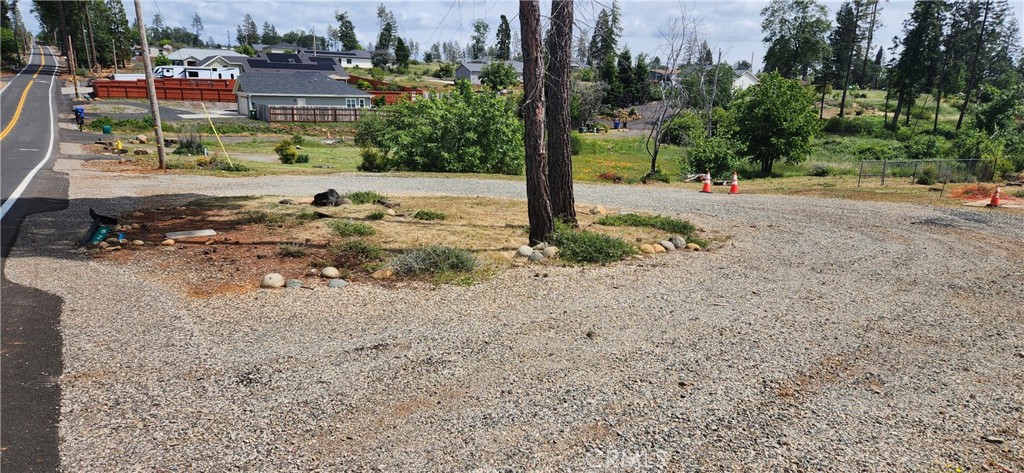 820 Bille Road Paradise, CA 95969 - Photo 3 of 17 a view of a road with a bench in front of it