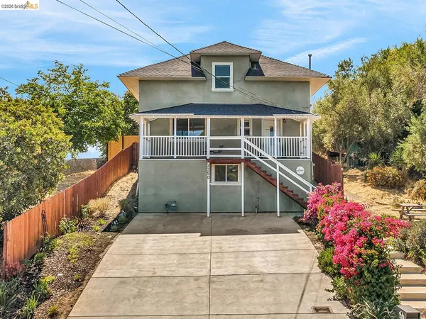 a house view with a outdoor space