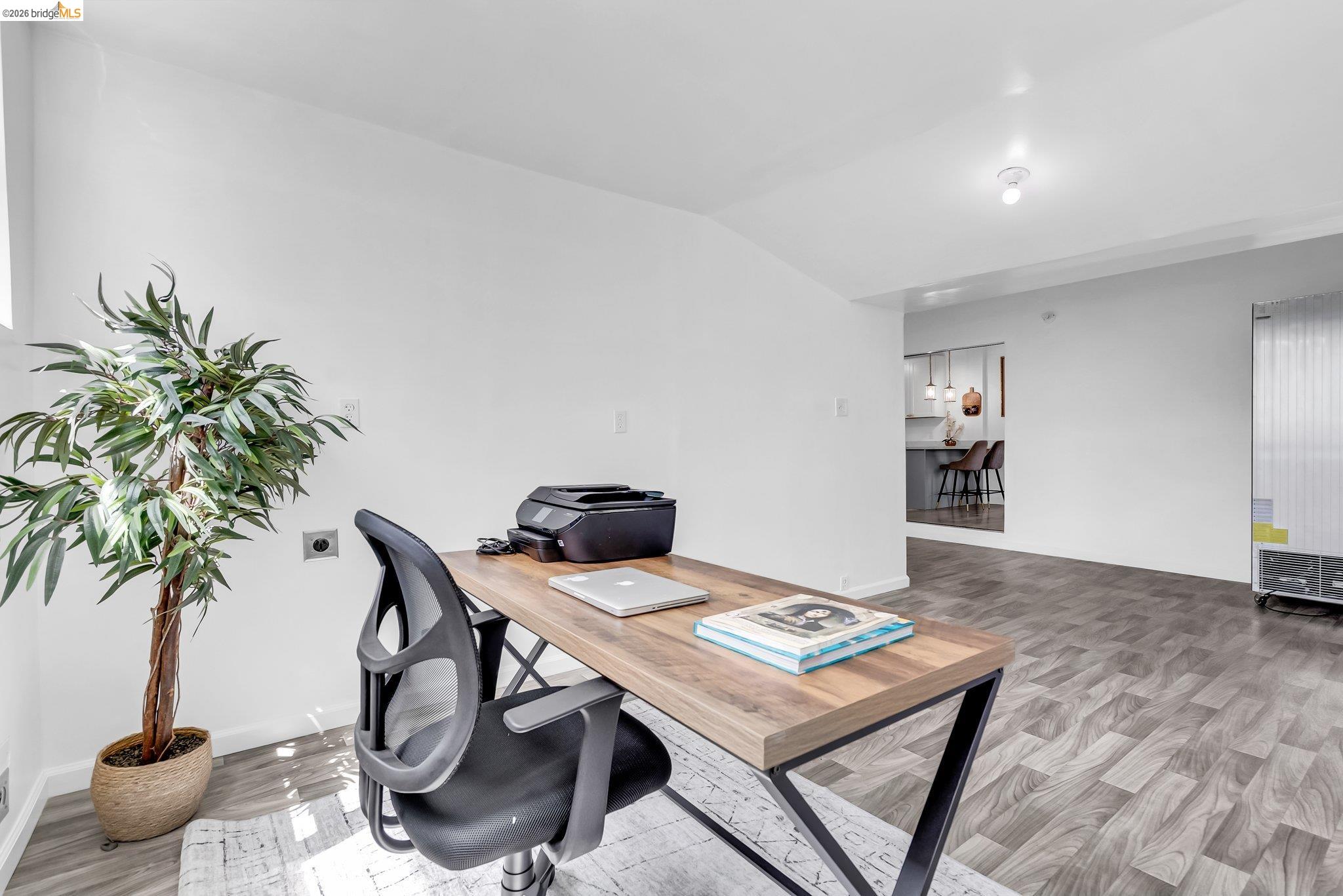 2350 West Shell Avenue Martinez, CA 94553 - Photo 19 of 39 a living room with furniture and a potted plant