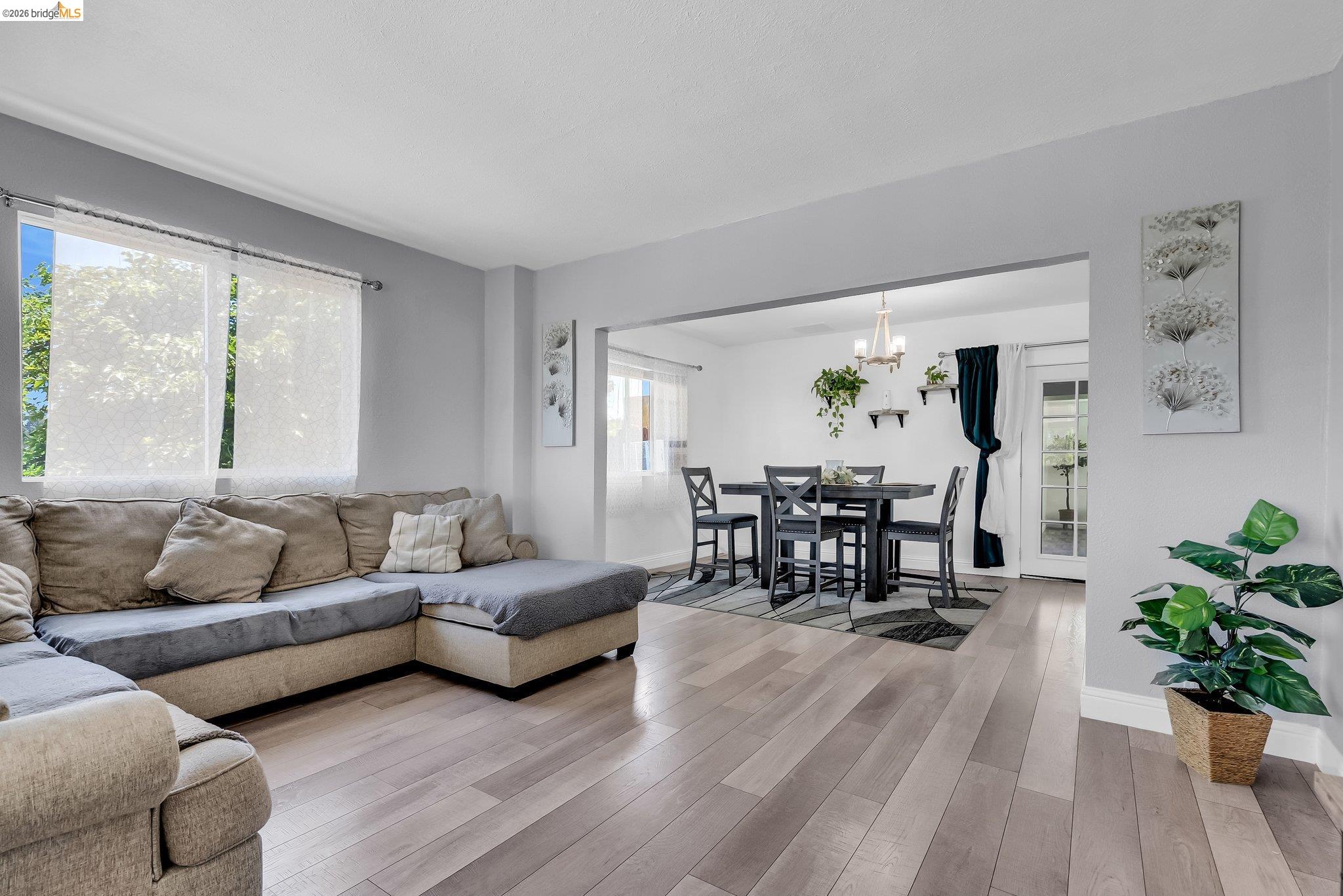 2350 West Shell Avenue Martinez, CA 94553 - Photo 2 of 39 a living room with furniture and wooden floor