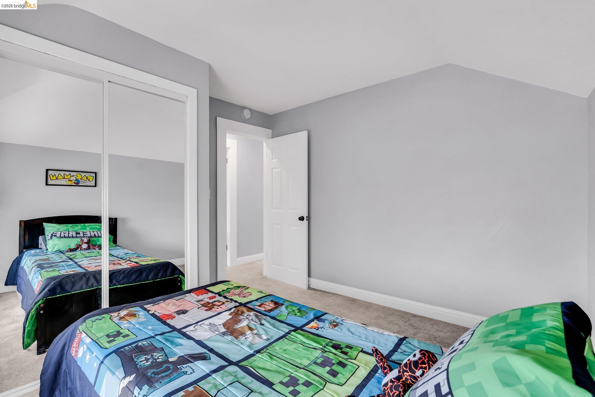 2350 West Shell Avenue Martinez, CA 94553 - Photo 23 of 39 a bedroom with two beds and a lamp