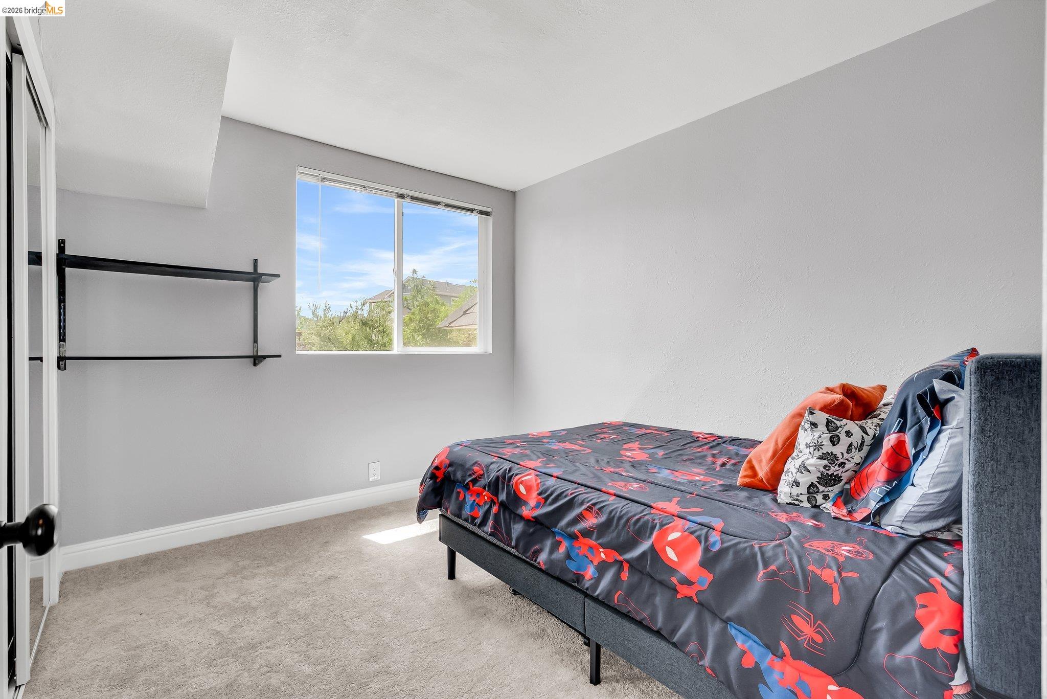 2350 West Shell Avenue Martinez, CA 94553 - Photo 27 of 39 a bedroom with a bed and a window