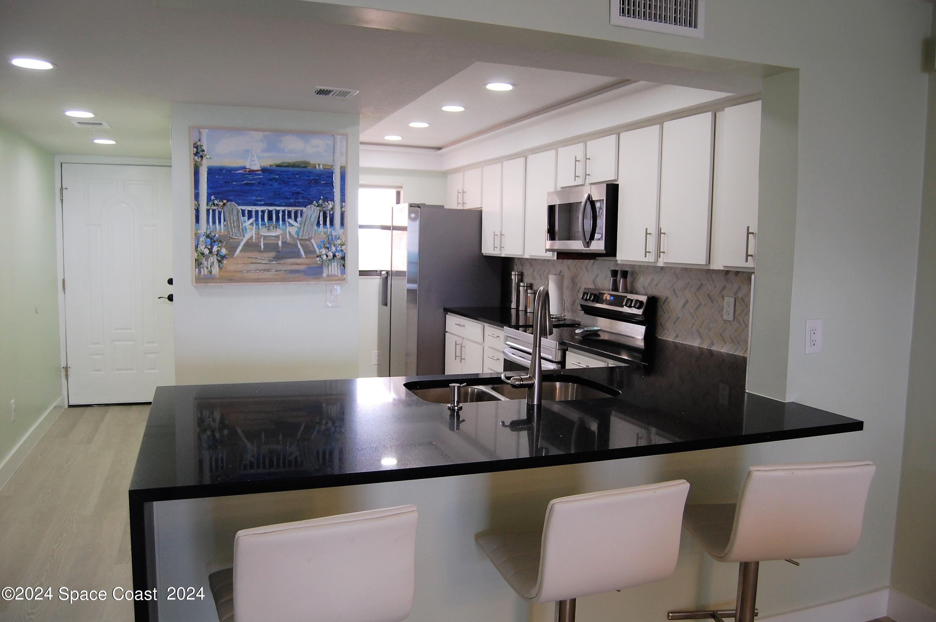 1860 North Atlantic Avenue, Unit 405 Cocoa Beach, FL 32931 - Photo 3 of 42 DSC_0192 (2)