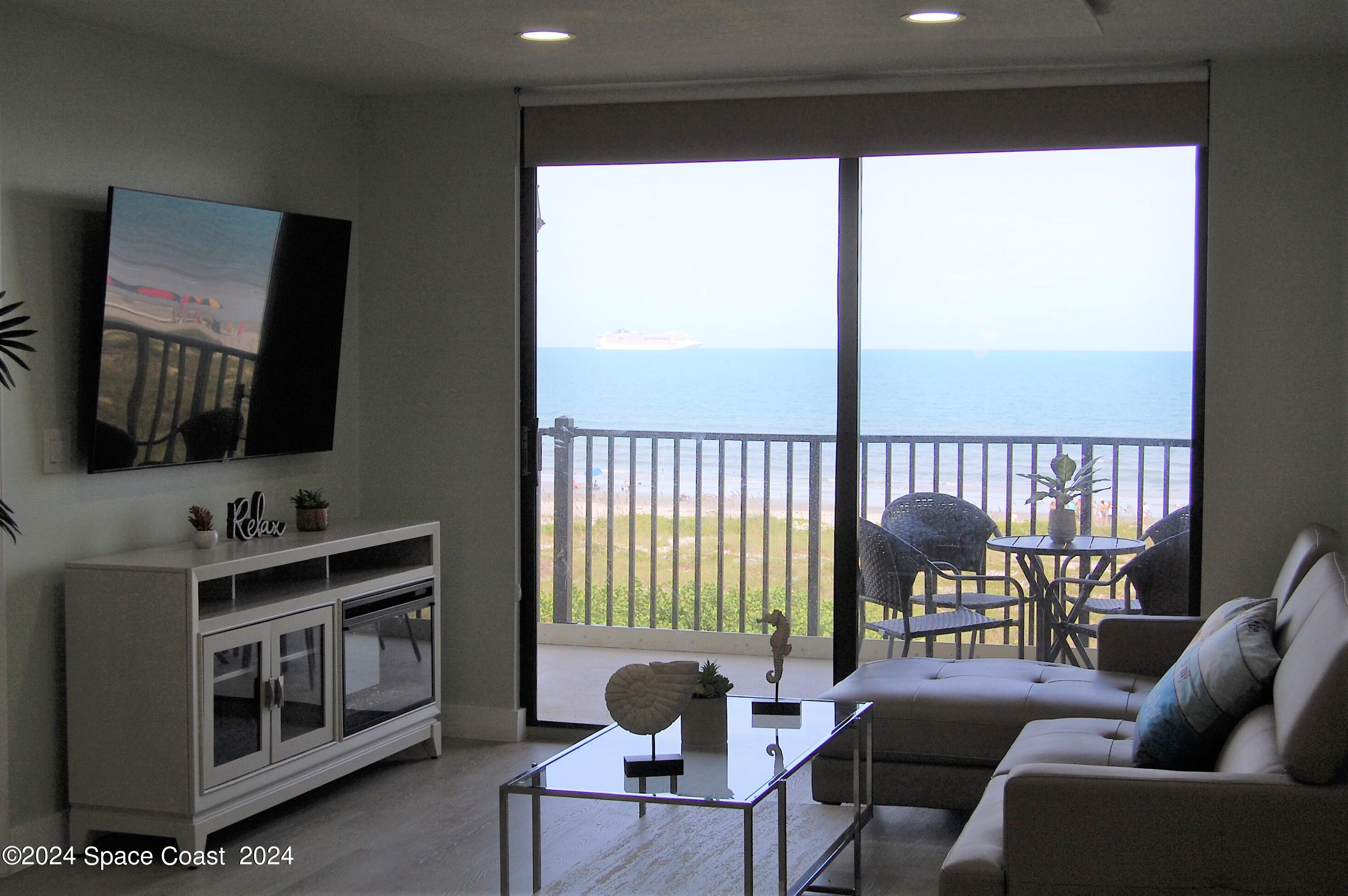 1860 North Atlantic Avenue, Unit 405 Cocoa Beach, FL 32931 - Photo 7 of 42 Royale Towers B405 - Living View